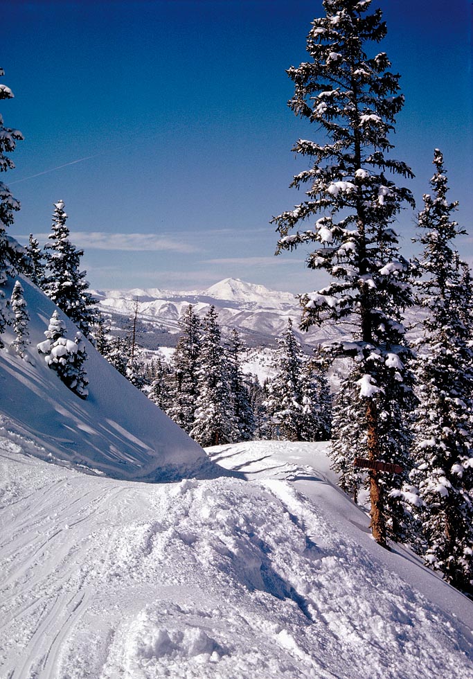 This is the "Cutoff" to the Buckhorn trail near the top of Ajax. It goes with the other Aspen winter 1962-63 pics submitted earlier. This favorite one was saved in a different place and I just now found it. 35mm Kodachrome slide. View full size.